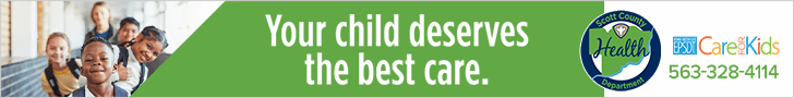 Smiling children in hall at school & logo