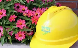 Flowers and a hard hat.