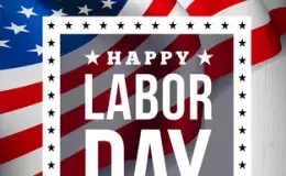 This is a flag with the words Happy Labor Day over it. 