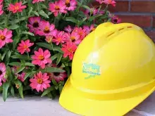 Flowers and a hard hat.