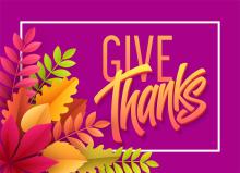 sign that says give thanks. leaves and purple background