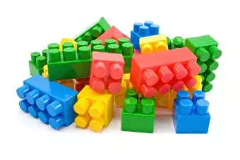This is a picture of multi-colored LEGOs in a pile.