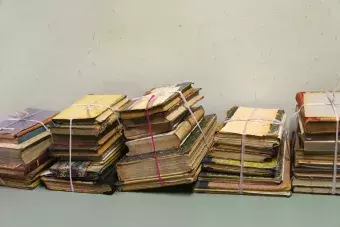 older worn pile of books