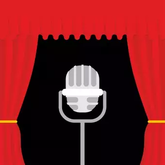 microphone in front of a red curtain