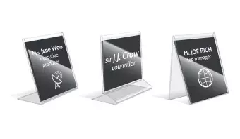 3 name tags in plastic holders