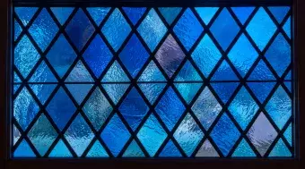 blue purple and green stained glass window