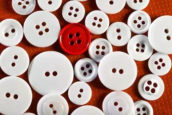 Buttons of various sizes and colored white and red