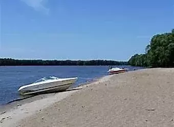 Boats anchored to shore at Buffalo Beach.