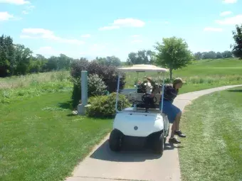 Photo of golf cart on course