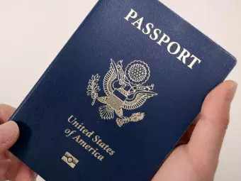 Holding a US Passport.