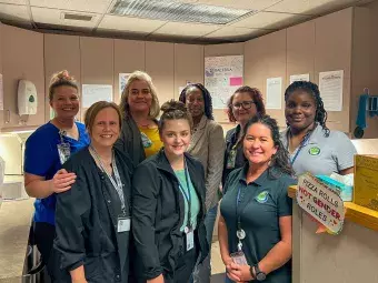Clinic Staff Smiling in Lab