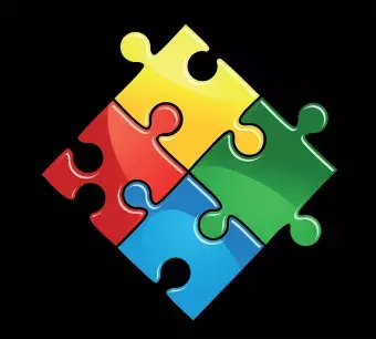 Pieces of puzzle game in yellow, green, blue and red