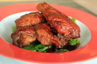Buffalo wings on a plate.