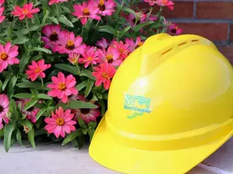 Flowers and a hard hat.