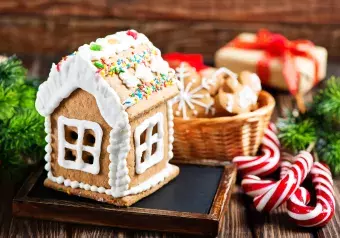 Gingerbread house with christmas candies.