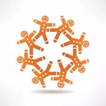 Gingerbread men in a circle on white background