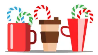 Cups of hot coffee with Christmas candy sticking out.