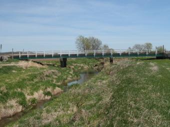 Image of the bridge crossing the creek.