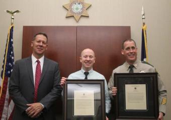 The Sheriff with Lieutenant Joe Caffery and Deputy Dan Grafton.