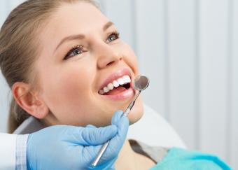 Woman smiling at dentist 