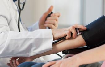 Blood pressure being checked