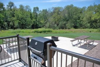 The cabin features a propane grill and handicapped accessible patio.