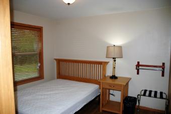 Bedroom with queen size bed.