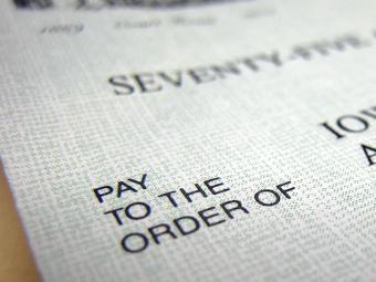 "Pay to the Order of" printed on the front of a check.
