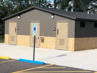 Front view of the Woodside Campground restroom / shower house.