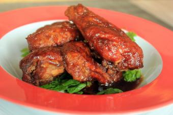 Buffalo wings on a plate.