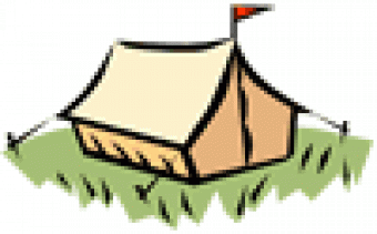 A tent in the grass.