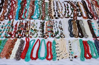 lots of beaded jewelry in different colors