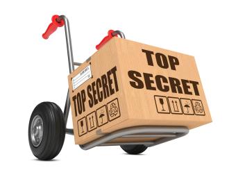 box with top secret on 2 wheel dolly