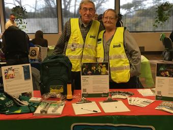 Members of CERT in front of literature table.