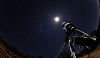 Telescope looking up at the night sky