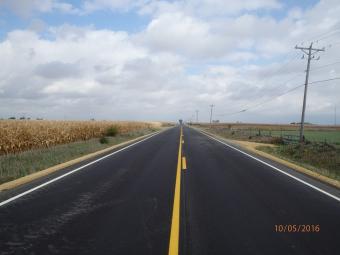 A newly paved country side roadway.