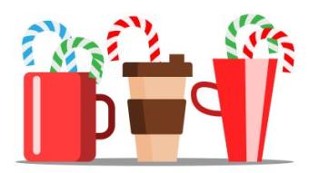 Cup Of Hot Coffee With Christmas Candy Sticking Out 
