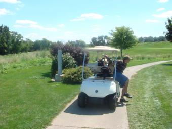 Photo of golf cart on course