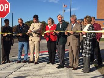 Board of Supervisors ribbon cutting sidewalk construction dedication.