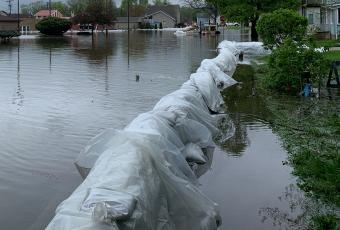 flood waters with barrier wall