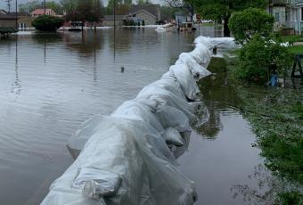 flood waters with barrier wall