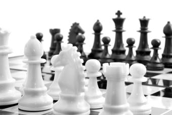 chess on board over white