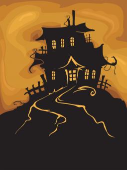 Silhouette of a haunted house on a hill, with an orange sky