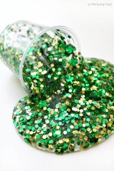Spilled jar of glittery green slime.