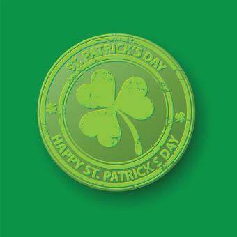 Green coin with shamrock and text on green background image