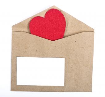 Photo of a Paper Package With Valentine Card