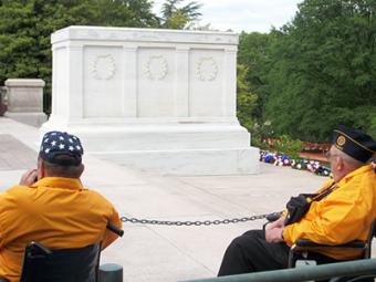 Honor flight veterans at a memorial in Washington DC.