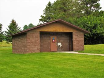 Modern restroom located near the shelter.