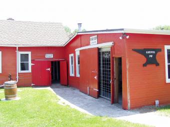 Exterior view of the blacksmith shop.