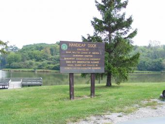 Welcome information sign to Railroad Lake.